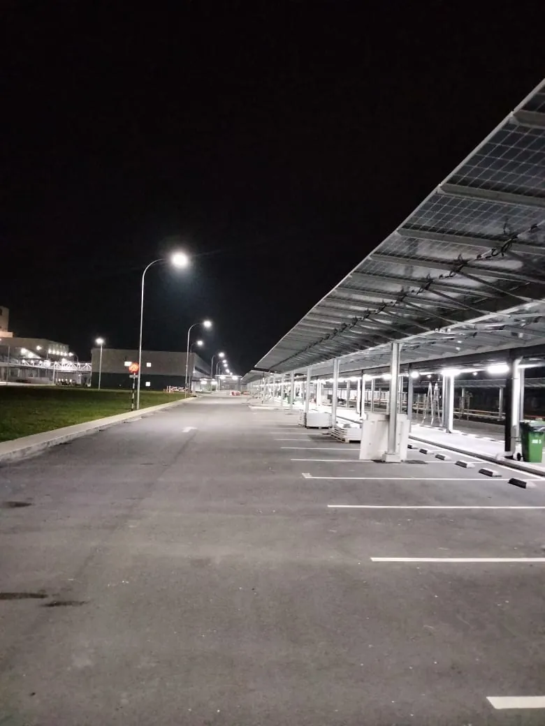 Solar carport and rooftop arrays at a food-ingredient plant (view 2)
