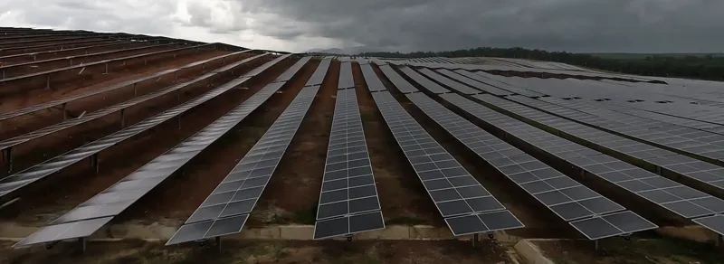 Single-axis tracker rows on a ground-mounted solar farm